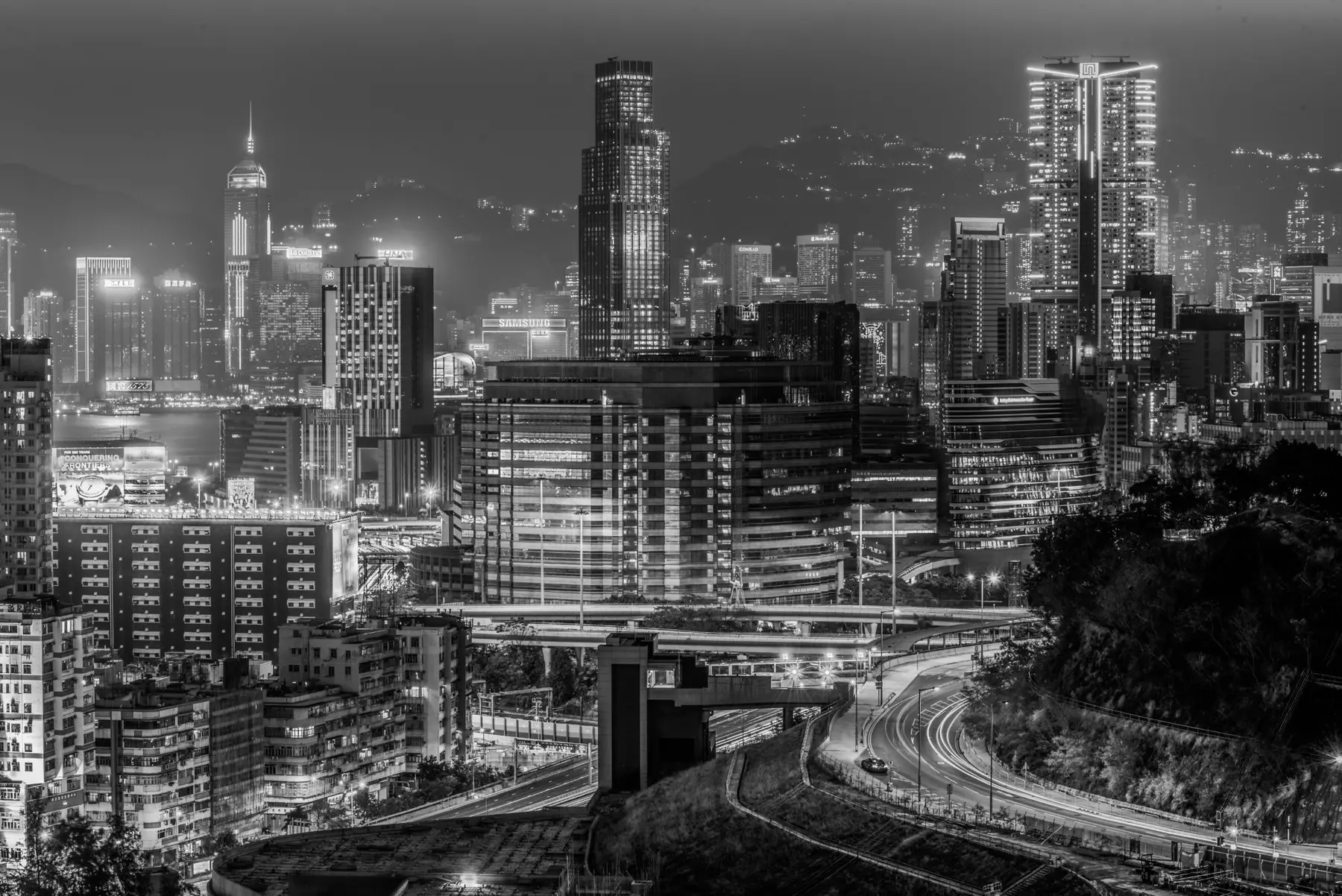 City skyline and road junctions lit up at night